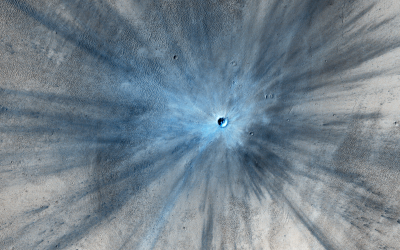 Illustration for article titled A Spectacular New Crater Shows the Hostile Face of Mars